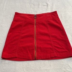 Forever 21 ladies size 26 waist, Reddish-orange small twill corduroy skirt.